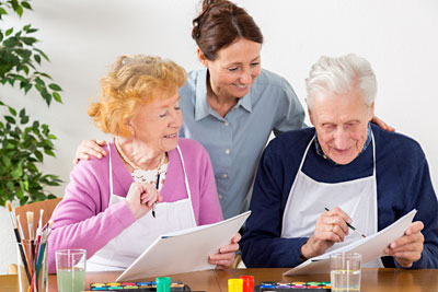 Nurse with two therapy patients